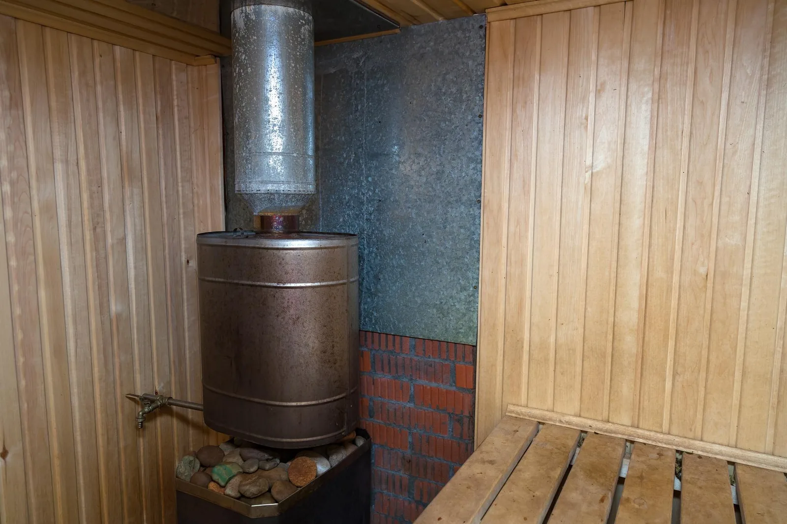 Siège chaudière à bois installé sur un installation domestique